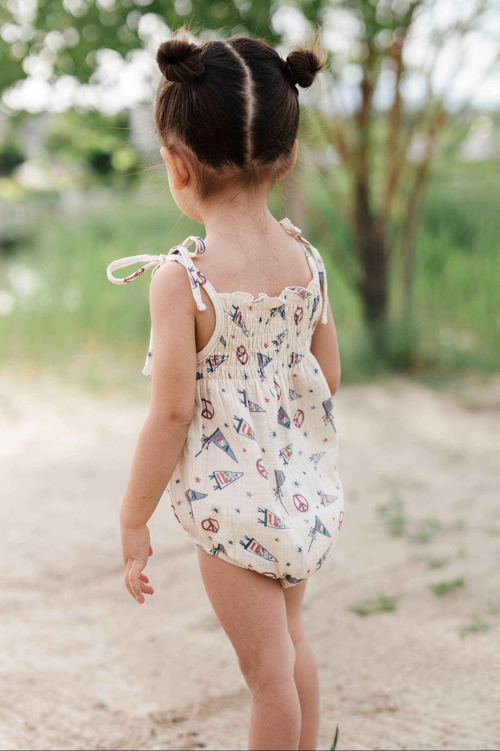 Americana Tie Smocked Bodysuit in USA Flag