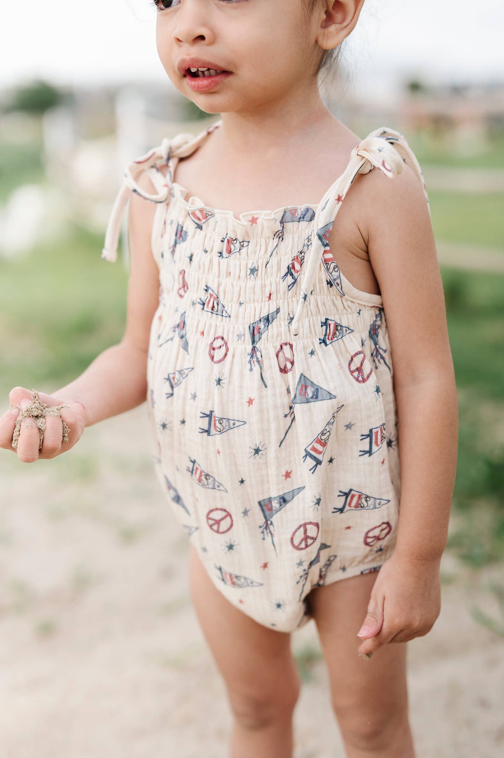 Americana Tie Smocked Bodysuit in USA Flag